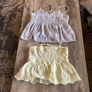 AMERICAN EAGLE TOPS. one medium and one large.